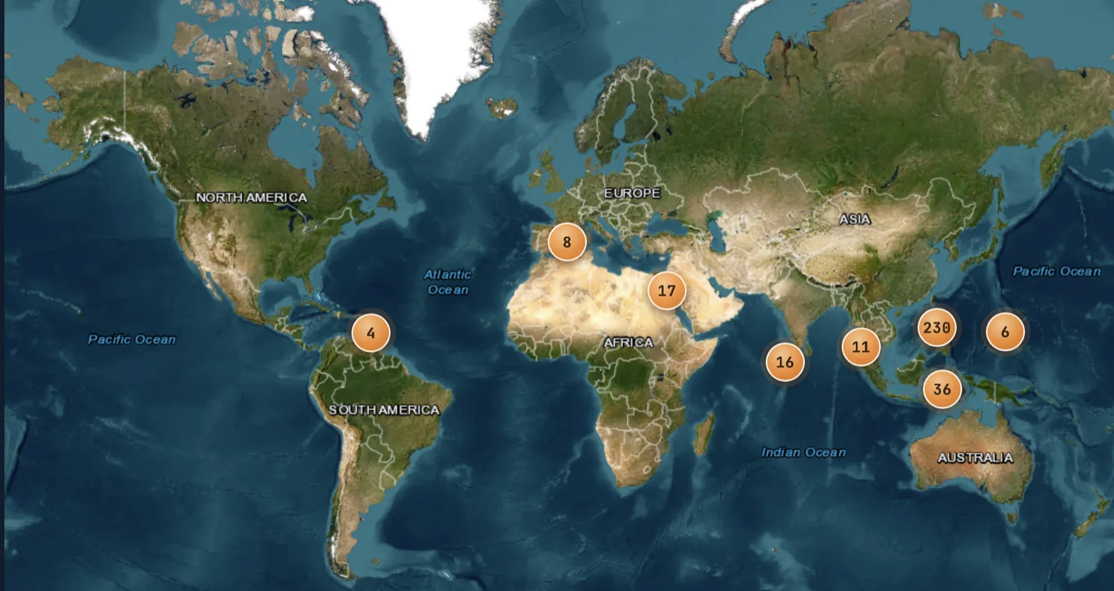 A world map with pins marking every country the owner has dived in, sized by number of dives